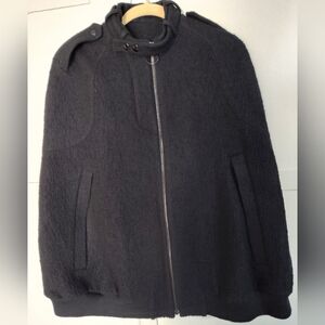 Alexander Wang Vintage SM black wool bouclé cape also described As poncho Lined